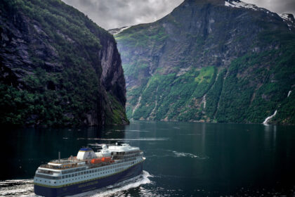 Havila cruising in Geiranger